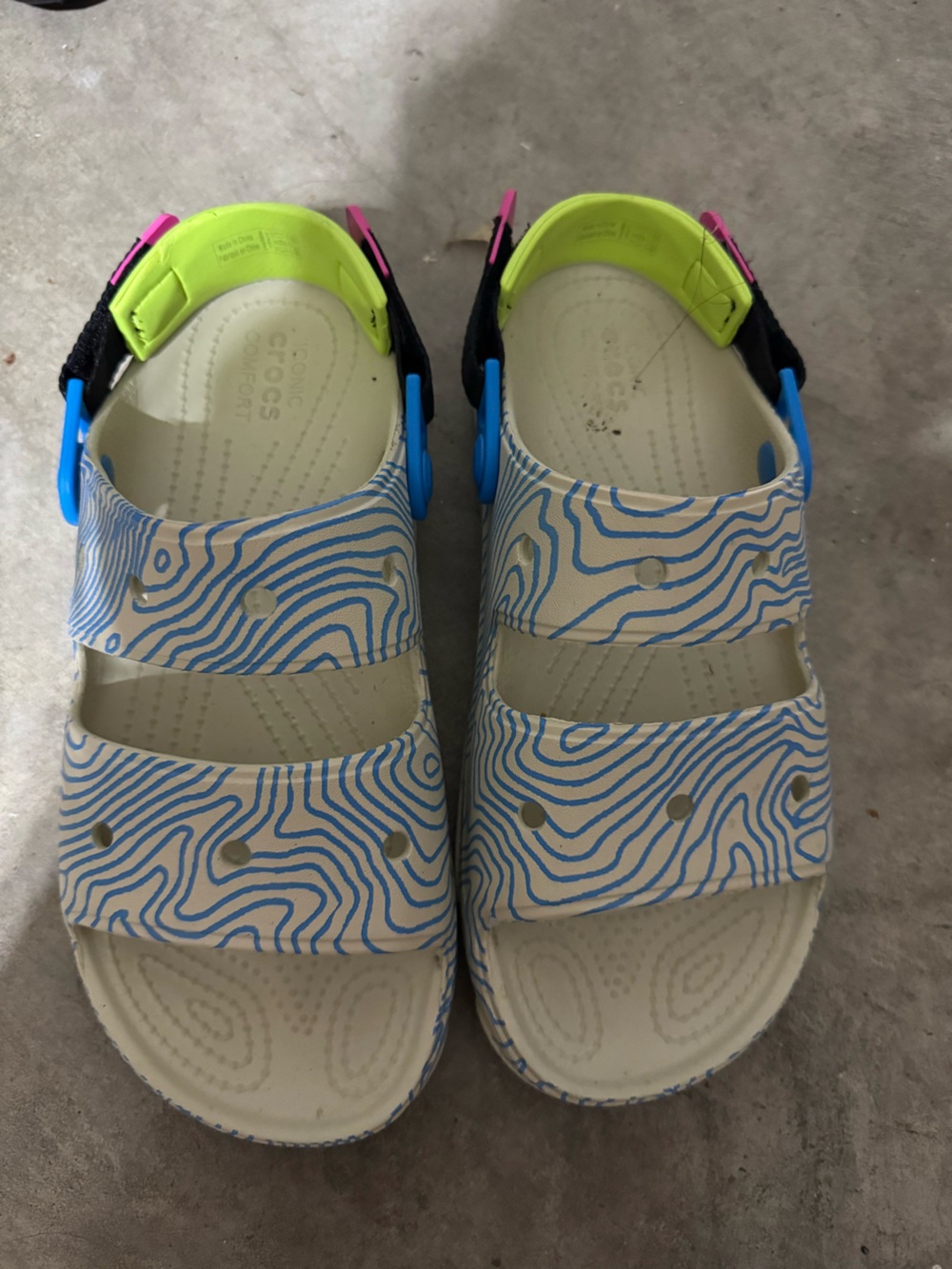 Crocs Women’s Blue Patterned Sandals with Neon Accents Size 10